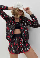 Shorts duplo preto com bolso estampado Voá