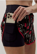 Shorts duplo preto com bolso estampado Voá